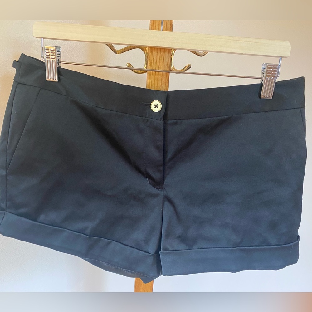 Silky black Express shorts with gold links. Size 10